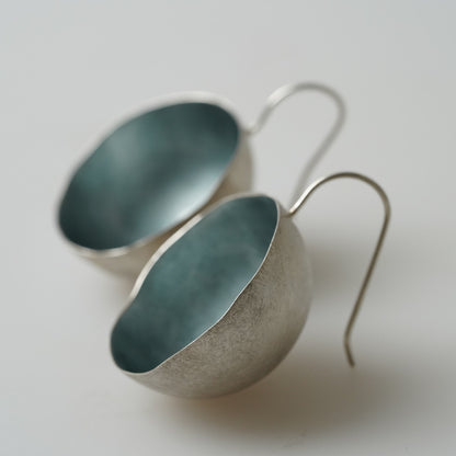 The Teal Colored Enameled Sterling Silver Saucer Earrings by ELGIN FISCHER