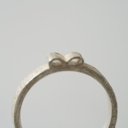 Ribbon of Love Wedding Ring by Petra Doemling